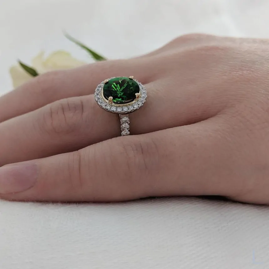 Platinum 1.73ct Oval Cut Emerald and Diamond Halo Ring